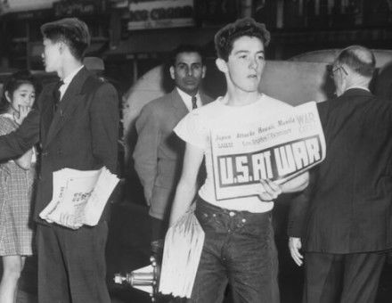 Newsboys in Little Tokyo, their papers carrying news of Pearl Harbor, 7 December 1941. University of Southern California.