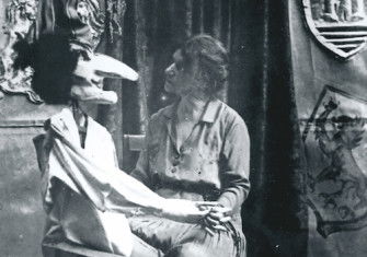 Nina Simonovich-Efimova with a Petrushka puppet, 1930. Museum Archive of the Obraztsov State Central Puppet Theatre.