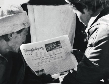 Tibetans reading Tibet Daily, 1989. Ma Jingqui/AFP/Getty Images.