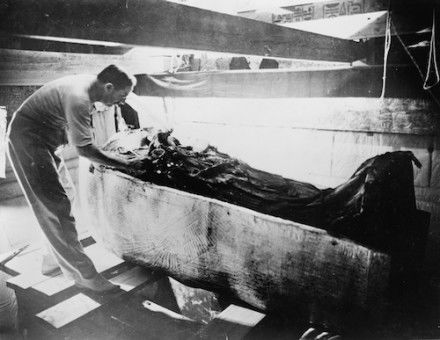Howard Carter turning back a shroud covering the inner coffin of Tutankhamen, 4 March 1926. Library of Congress. Public Domain.